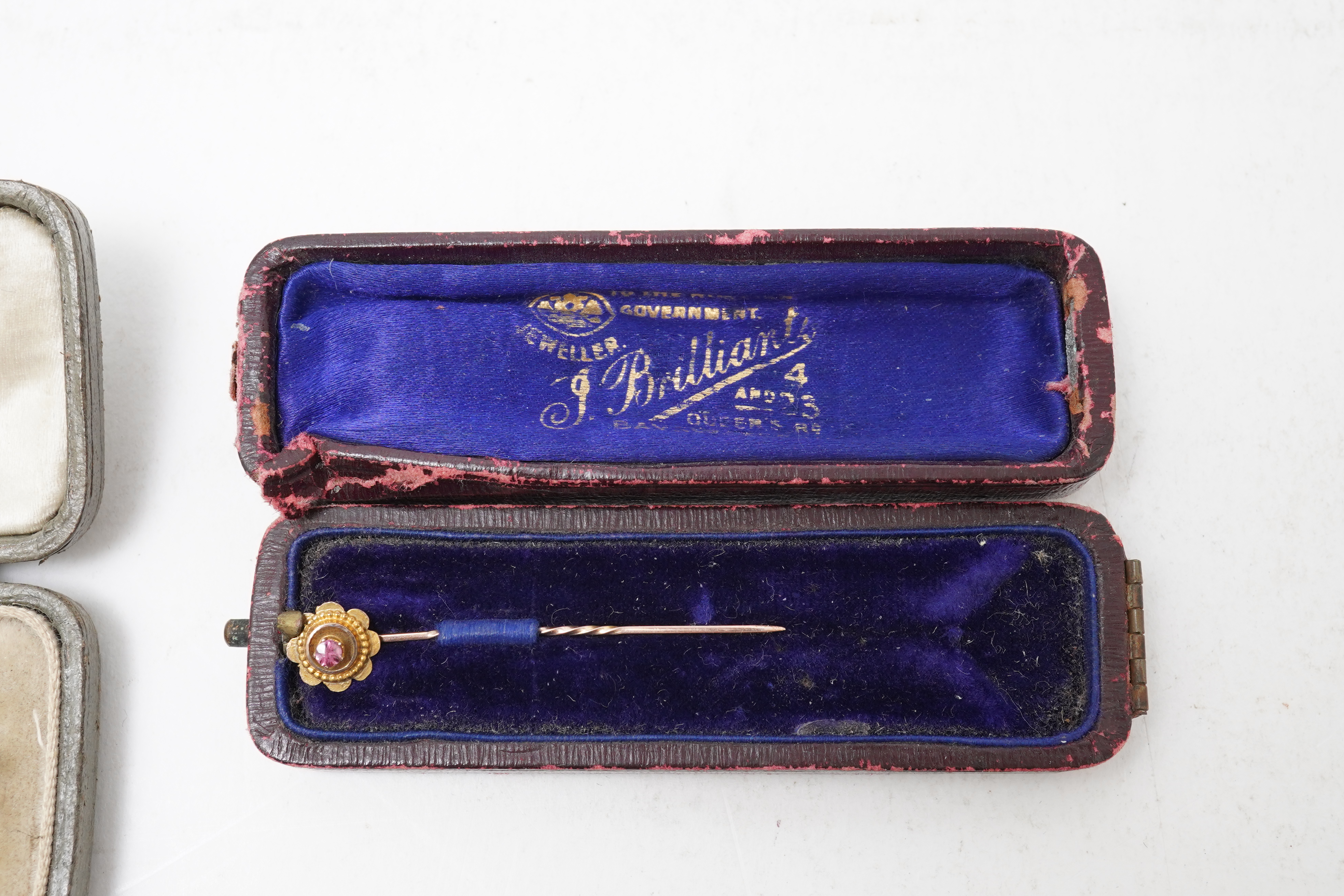 A collection of jewels including an Art Deco silver cigarette case